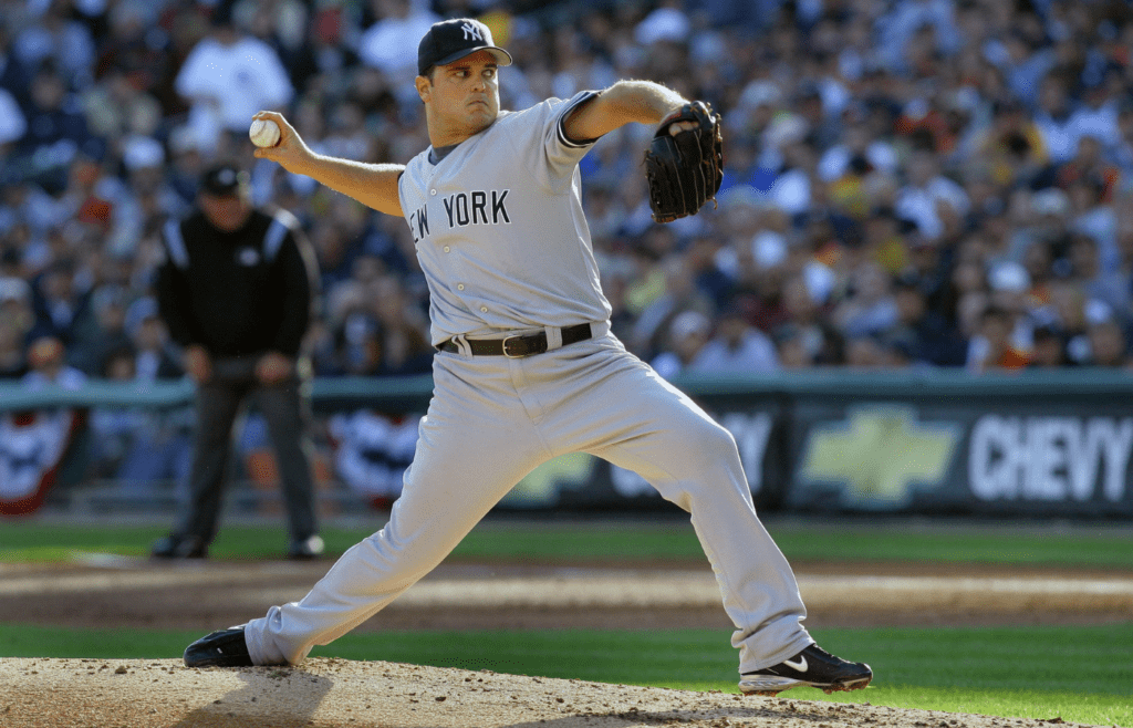 Oct 7, 2006; Detroit, MI, USA; New York Yankees starting pitcher (34) Jaret Wright delivers a pitch against the Detroit Tigers at Comerica Park. Mandatory Credit: Tom Szczerbowski-Imagn Images Copyright Tom Szczerbowski
