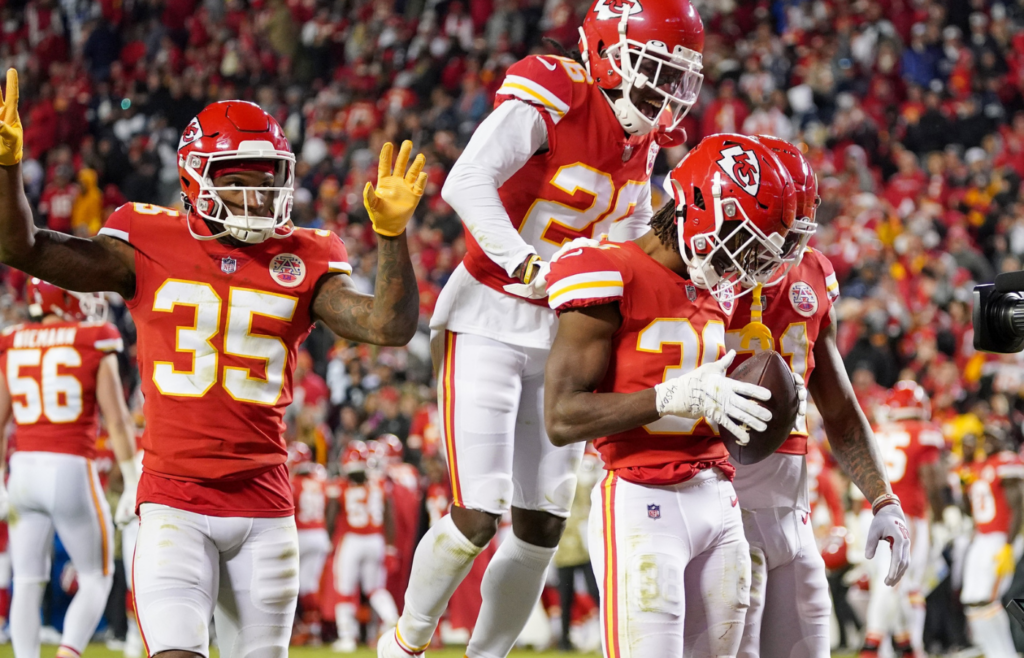 Nov 21, 2021; Kansas City, Missouri, USA; Kansas City Chiefs cornerback L'Jarius Sneed (38) celebrates with team mates after intercepting a pass against the Dallas Cowboys during the second half at GEHA Field at Arrowhead Stadium. Mandatory Credit: Denny Medley-Imagn Images