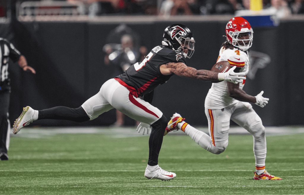Sep 22, 2024; Atlanta, Georgia, USA; Atlanta Falcons safety Jessie Bates III (3) tries to intercept a pass deflected off of Kansas City Chiefs wide receiver Rashee Rice (4) during the first half at Mercedes-Benz Stadium. Mandatory Credit: Dale Zanine-Imagn Images