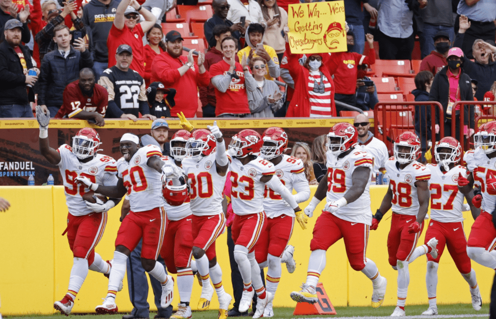 Oct 17, 2021; Landover, Maryland, USA; Kansas City Chiefs defensive tackle Tershawn Wharton (98) celebrates with teammates after intercepting a pass against the Washington Football Team during the fourth quarter at FedExField. Mandatory Credit: Geoff Burke-Imagn Images