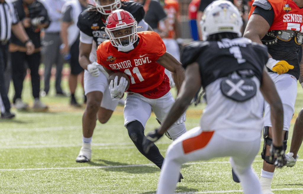 Jan 29, 2025; Mobile, AL, USA; American team wide receiver Arian Smith of Georgia (11) runs the ball during Senior Bowl practice for the American team at Hancock Whitney Stadium. Mandatory Credit: Vasha Hunt-Imagn Images