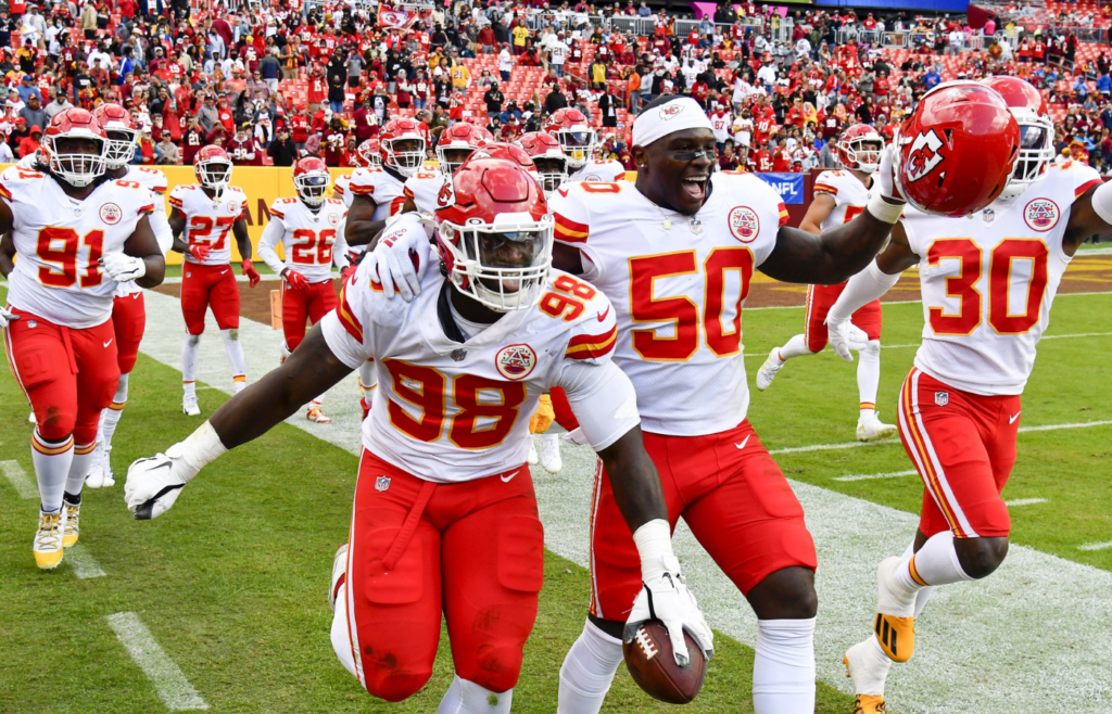 Oct 17, 2021; Landover, Maryland, USA; Kansas City Chiefs defensive end Tershawn Wharton (98) reacts with teammates after intercepting pass against the Washington Football Team during the second half at FedExField. Mandatory Credit: Brad Mills-Imagn Images