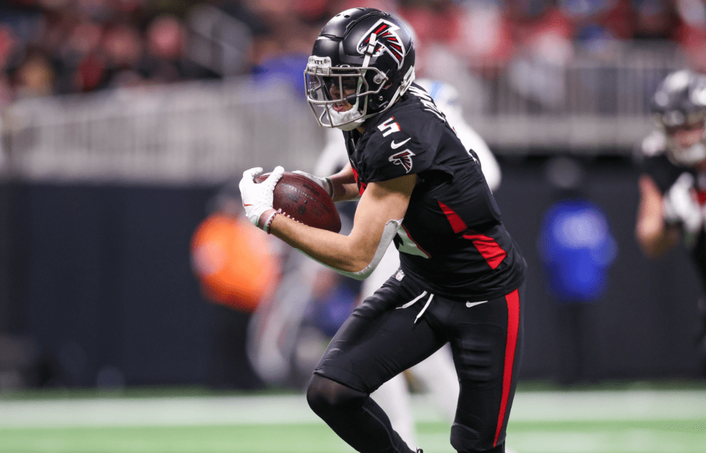 Jan 5, 2025; Atlanta, Georgia, USA; Atlanta Falcons wide receiver Drake London (5) runs after a catch against the Carolina Panthers in the second quarter at Mercedes-Benz Stadium. Mandatory Credit: Brett Davis-Imagn Images