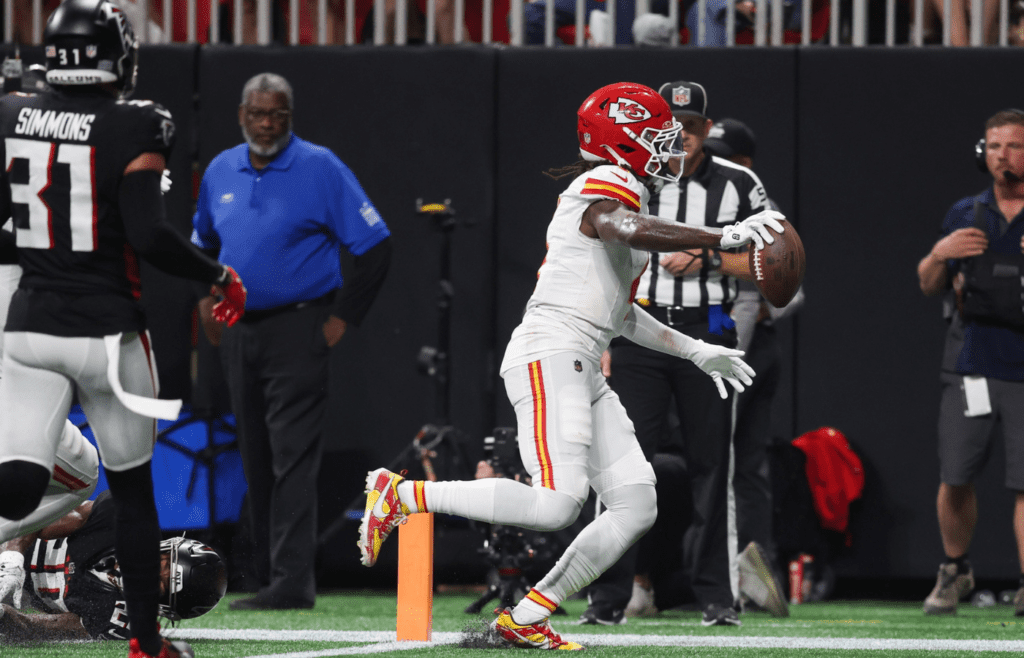 Sep 22, 2024; Atlanta, Georgia, USA; Kansas City Chiefs wide receiver Rashee Rice (4) scores a touchdown against the Atlanta Falcons in the second quarter at Mercedes-Benz Stadium. Mandatory Credit: Brett Davis-Imagn Images