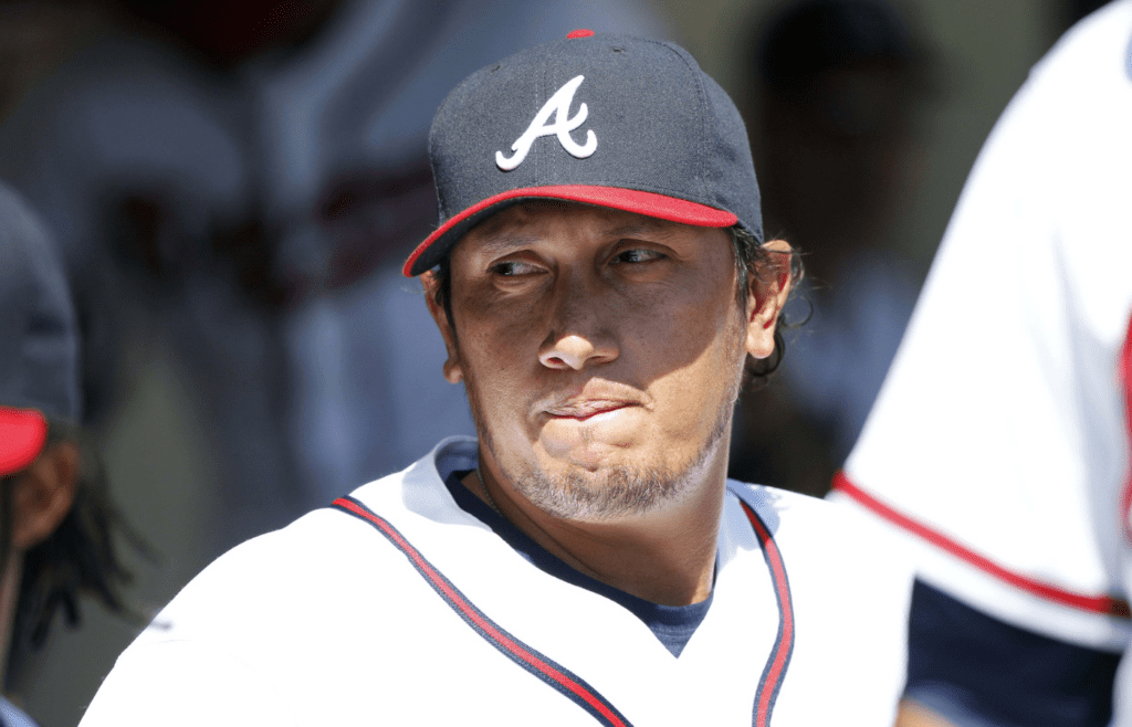 Mar 14, 2014; Lake Buena Vista, FL, USA; Atlanta Braves pitcher Freddy Garcia (34) in the dugout against the Tampa Bay Rays at Champion Stadium. Mandatory Credit: Kim Klement-Imagn Images
