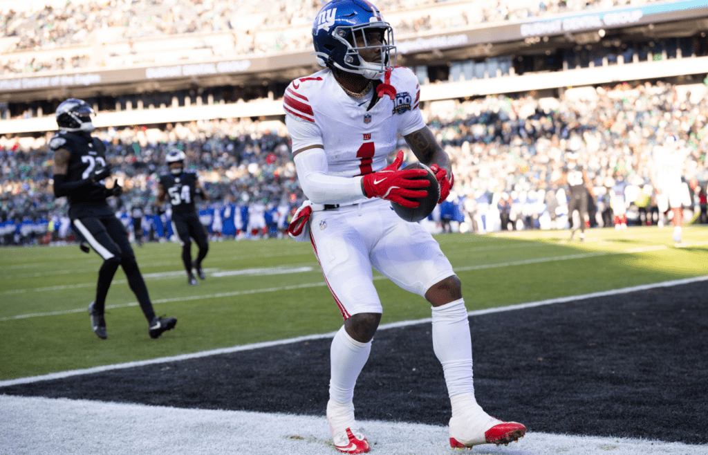 Jan 5, 2025; Philadelphia, Pennsylvania, USA; New York Giants wide receiver Malik Nabers (1) scores a touchdown against the Philadelphia Eagles during the fourth quarter at Lincoln Financial Field. Mandatory Credit: Bill Streicher-Imagn Images