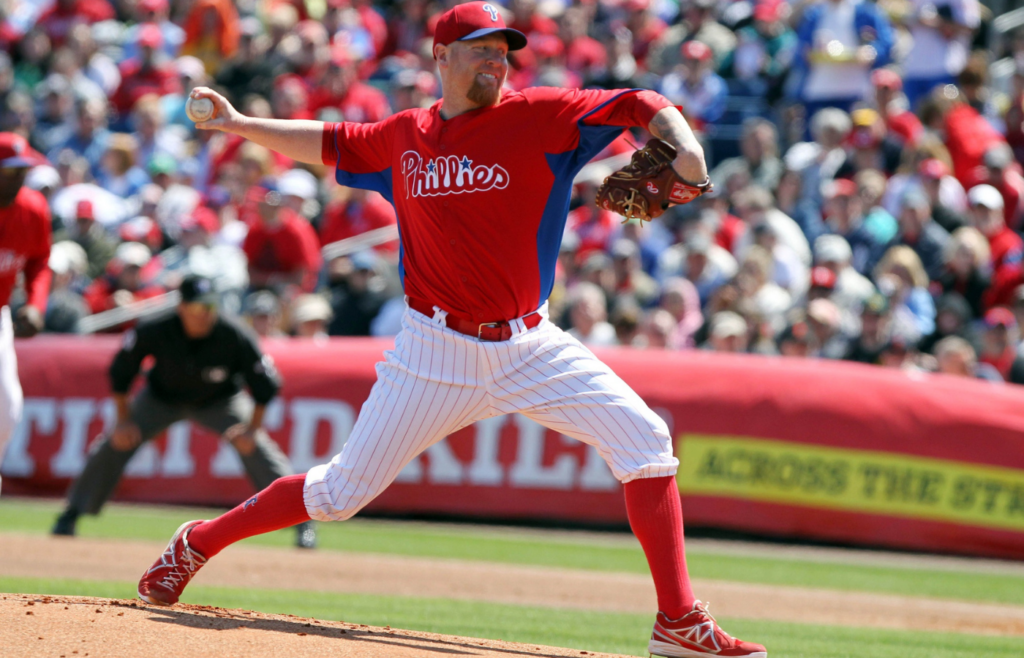 March 14, 2013; Clearwater, FL, USA; Philadelphia Phillies starting pitcher Aaron Cook (29) throws a pitch during the first inning against the Pittsburgh Pirates at Bright House Networks Field. Mandatory Credit: Kim Klement-Imagn Images