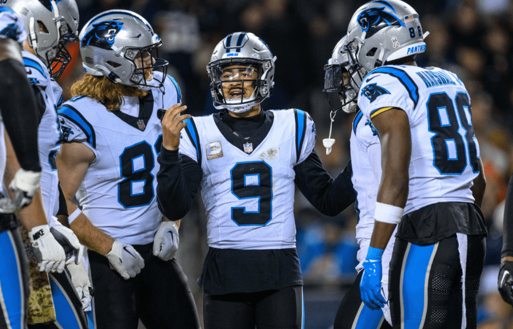 Nov 9, 2023; Chicago, Illinois, USA; Carolina Panthers quarterback Bryce Young (9) huddles his team against the Chicago Bears during the second quarter at Soldier Field. Mandatory Credit: Daniel Bartel-Imagn Images