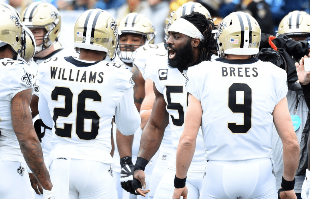 Dec 22, 2019; Nashville, Tennessee, USA; New Orleans Saints outside linebacker Demario Davis (56) talks in a team huddle before the game against the Tennessee Titans at Nissan Stadium. Mandatory Credit: Christopher Hanewinckel-Imagn Images