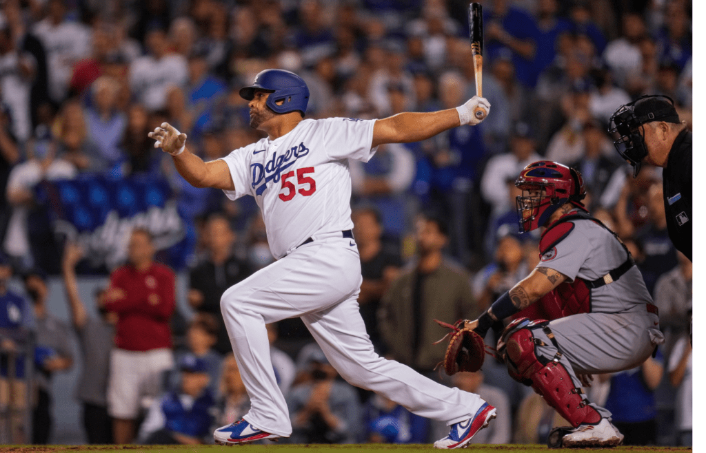 Los Angeles Dodgers pinch hitter Albert Pujols hits against the St. Louis Cardinals during the ninth inning of the National League Wild Card Game at Dodger Stadium on Oct 6, 2021.