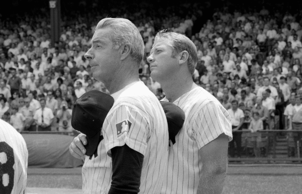 August 8, 1970; New York, NY, USA; Yankees Old Timers Joe DiMaggio and Mickey Mantle pause for the national anthem at the start of the annual Old-Timers' Day game at Yankee Stadium in New York City on August 8, 1970. Mandatory Credit: Stuart Davis-USA TODAY NETWORK