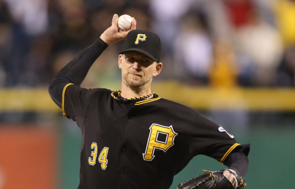 Oct 3, 2015; Pittsburgh, PA, USA; Pittsburgh Pirates starting pitcher A.J. Burnett (34) pitches against the Cincinnati Reds during the fifth inning at PNC Park. Mandatory Credit: Charles LeClaire-Imagn Images