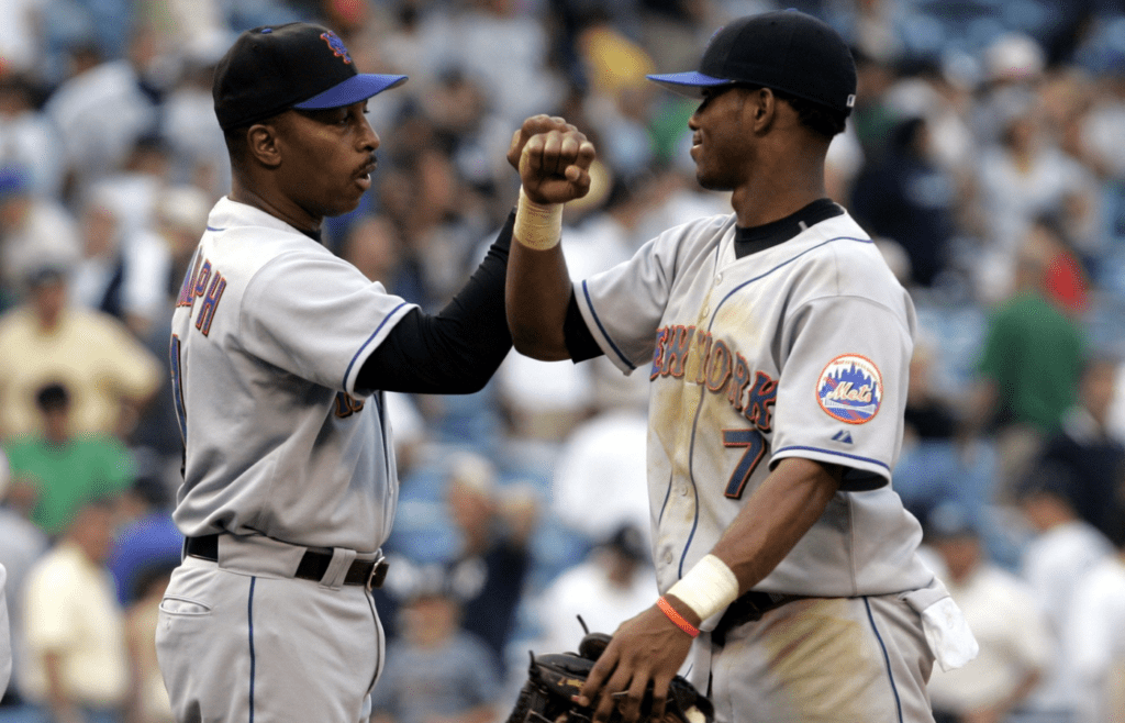 Mets manager Willie Randolph celebrates with Jose Reyes after the Mets defeated the Yankees 10 - 3 in the second game of the subway series at Yankee Stadium June 26, 2005