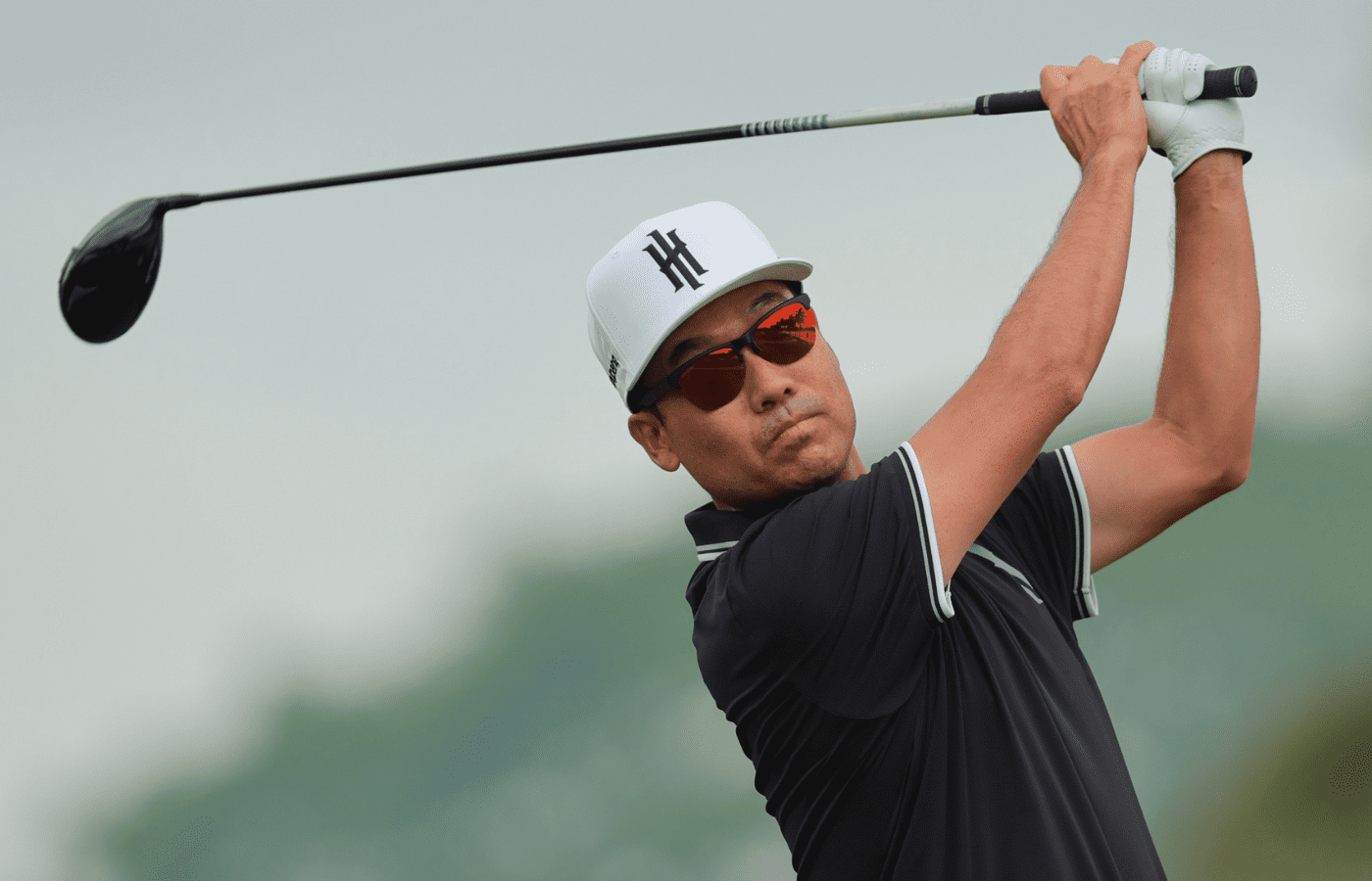 Apr 4, 2025; Miami, Florida, USA; Kevin Na plays his shot from the third tee during the first round of the LIV Golf Miami golf tournament at Trump National Doral. Mandatory Credit: Sam Navarro-Imagn Images