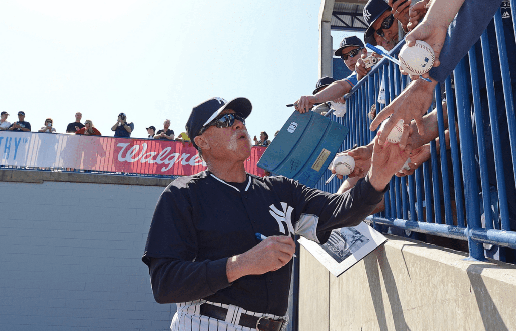 Feb 22, 2015; Tampa, FL, USA; Hall of Fame pitcher Goose Gossage signs autographs during Sunday's workout at George Steinbrenner Field. Mandatory Credit: Jonathan Dyer-Imagn Images