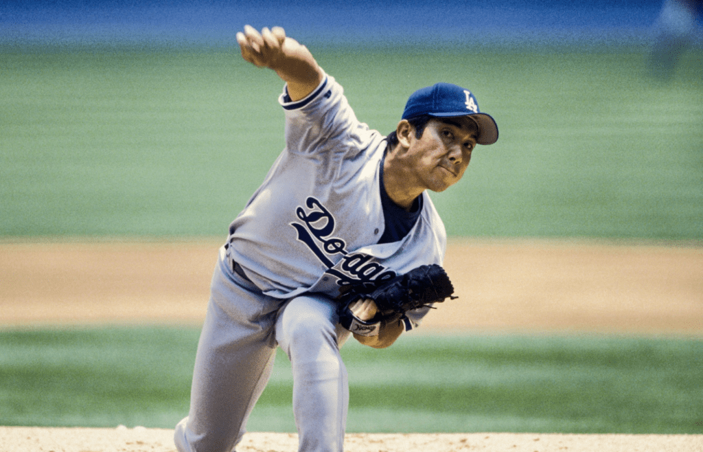 1996, Atlanta, GA, USA; FILE PHOTO; Los Angeles Dodgers pitcher Hideo Nomo in action on the mound against the Atlanta Braves at Fulton County Stadium during the 1996 season. Mandatory Credit: RVR Photos-Imagn Images