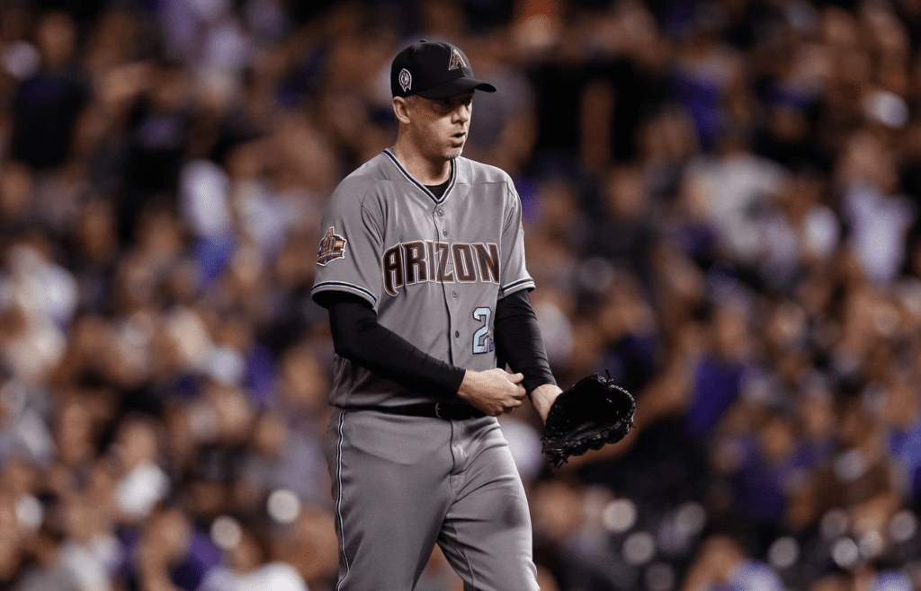 Sep 11, 2018; Denver, CO, USA; Arizona Diamondbacks relief pitcher Brad Ziegler (29) walks to the dugout at the end of the seventh inning against the Colorado Rockies at Coors Field. Mandatory Credit: Isaiah J. Downing-Imagn Images