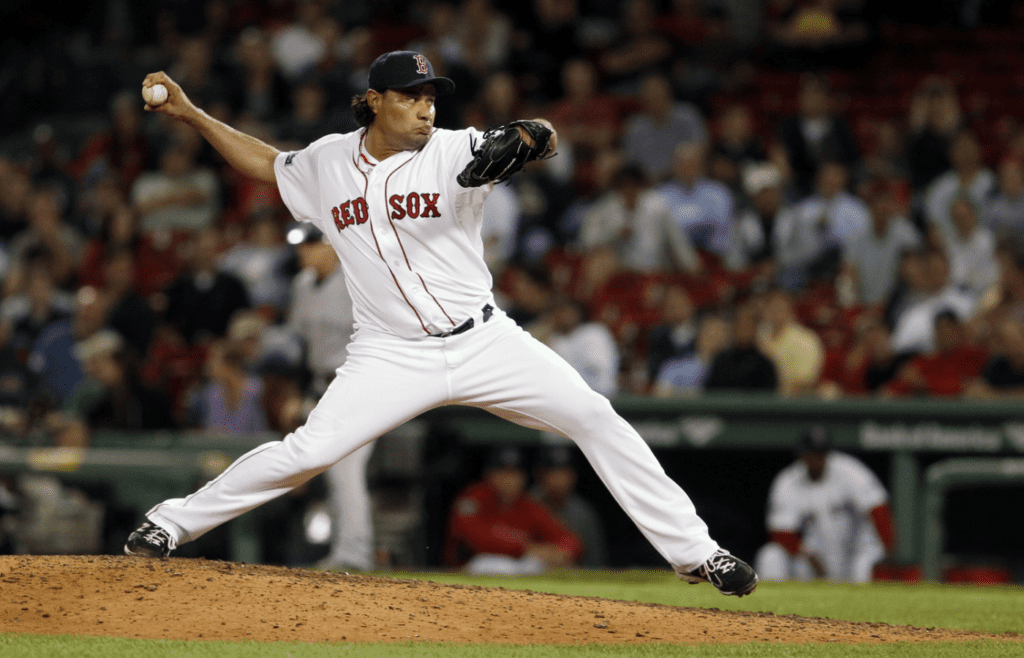 Sep 12, 2012; Boston, MA, USA; Boston Red Sox relief pitcher Vicente Padilla (44) throws a pitch against the New York Yankees during the ninth inning at Fenway Park. The New York Yankees defeated the Boston Red Sox 5-4. Mandatory Credit: David Butler II-Imagn Images