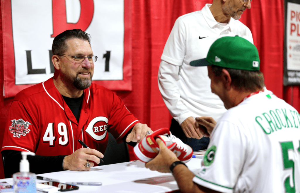 Former Cincinnati Reds pitcher Rob Dibble laughs with a fan during Redsfest on Friday at Duke Energy Convention Center. Cincinnati Reds Fest 11 30 2018