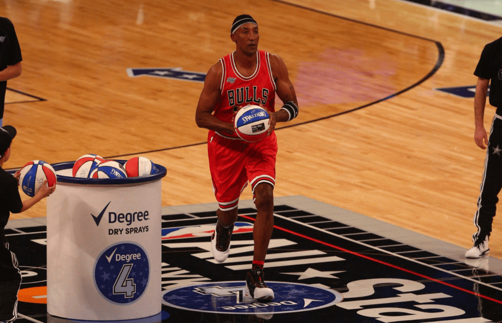 Feb 14, 2015; New York, NY, USA; Team Millsap legend Scottie Pippen shoots the basketball during the 2015 NBA All Star Shooting Stars competition at Barclays Center. Mandatory Credit: Brad Penner-Imagn Images