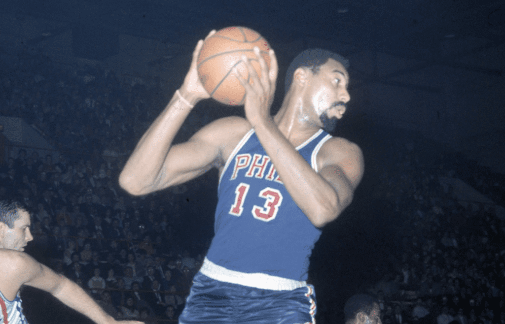 Unknown date; Cincinnati, OH, USA; FILE PHOTO; Philadelphia 76ers center Wilt Chamberlain (13) in action against the Cincinnati Royals at Cincinnati Gardens. Mandatory Credit: Photo By Malcolm Emmons-Imagn Images