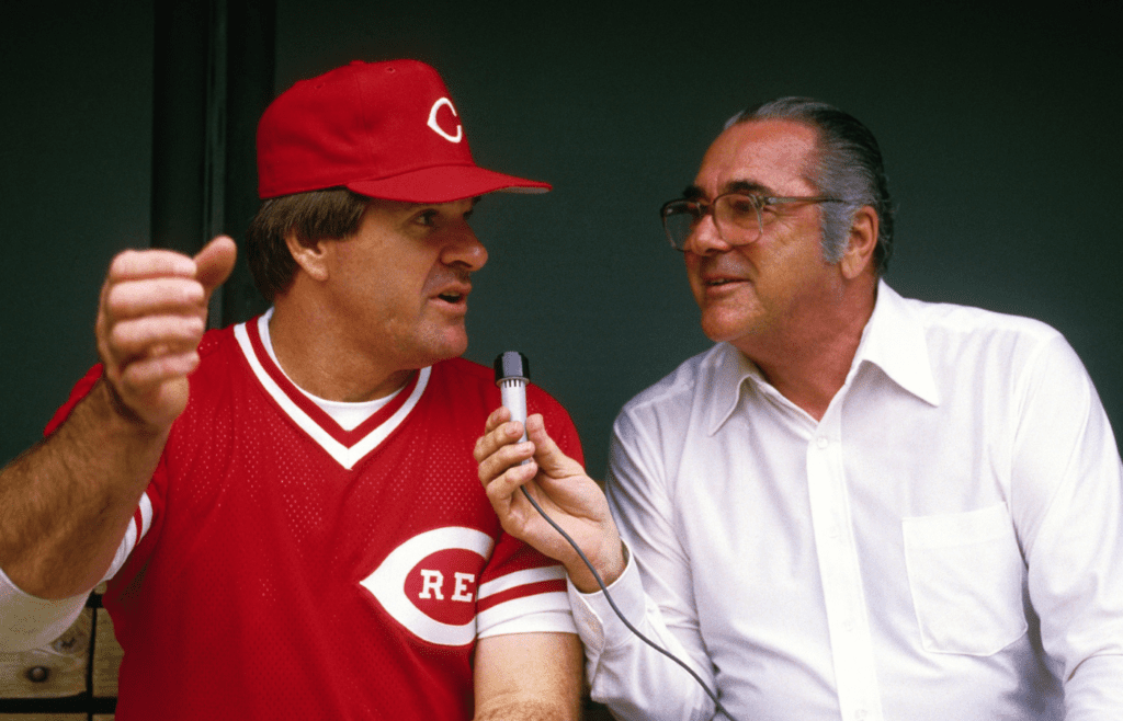1989; Cincinnati, OH, USA; FILE PHOTO; Cincinnati Reds manager Pete Rose talks with former player/manager Lou Boudreau in the dugout at Riverfront Stadium during the 1989 season. Mandatory Credit: Tony Tomsic-USA TODAY NETWORK
