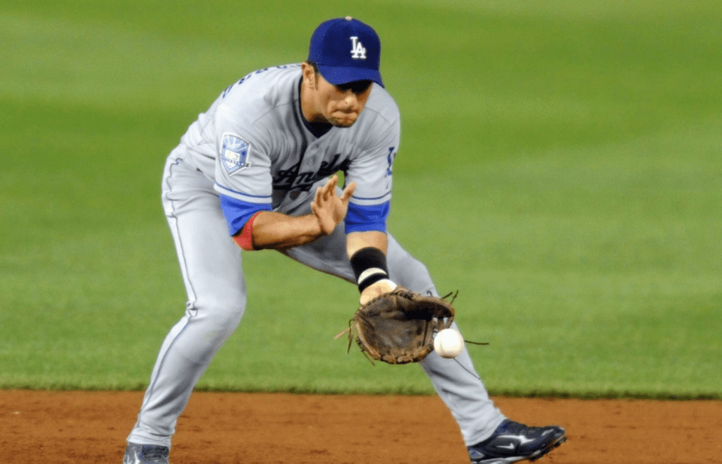 Aug 27, 2008; Washington, DC, USA; Los Angeles Dodgers shortstop Nomar Garciaparra (5) fields a ground ball in the third inning against the Washington Nationals at Nationals Park in Washington, DC. Mandatory Credit: James Lang-Imagn Images
