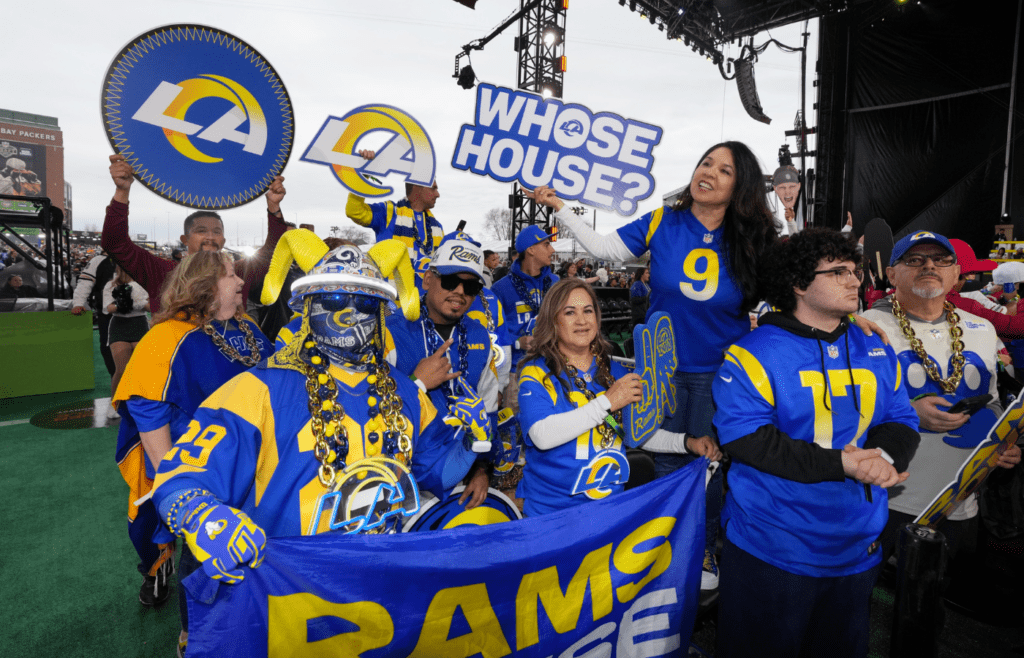 Apr 24, 2025; Green Bay, WI, USA; Los Angeles Rams fans cheer before the first round of the 2025 NFL Draft at Lambeau Field. Mandatory Credit: Kirby Lee-Imagn Images