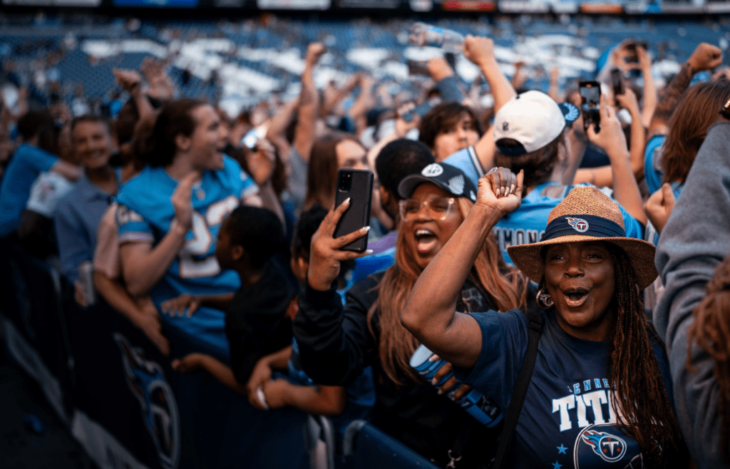 Fans cheer as the Tennessee Titans select Miami Hurricanes quarterback Cam Ward with the first overall pick during the Titans NFL Draft Watch Party at Nissan Stadium in Nashville, Tenn., Thursday, April 24, 2025