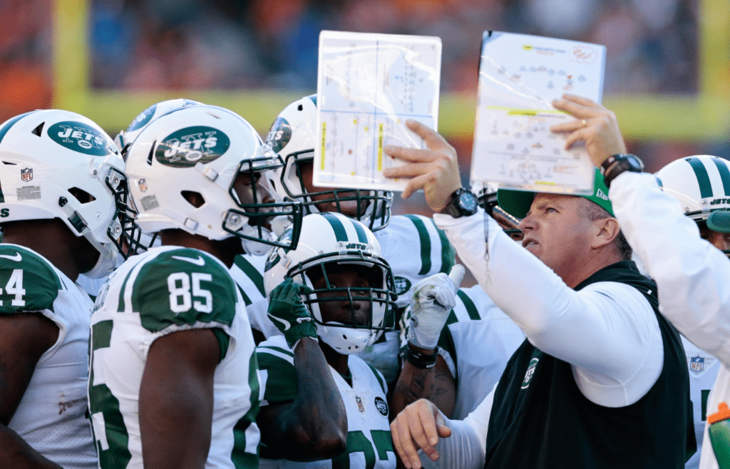 Dec 10, 2017; Denver, CO, USA; New York Jets tight end Neal Sterling (85) and wide receiver JoJo Natson (87) look on with teammates as assistant special teams coach Jeff Hammerschmidt holds up a play sheet in the second quarter against the Denver Broncos at Sports Authority Field at Mile High. Mandatory Credit: Isaiah J. Downing-Imagn Images