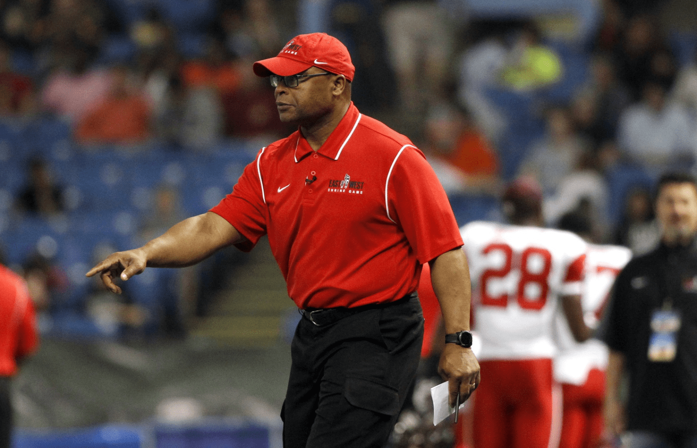 East head coach Mike Singletary points during the second quarter at the East-West Shrine Game at Tropicana Field .