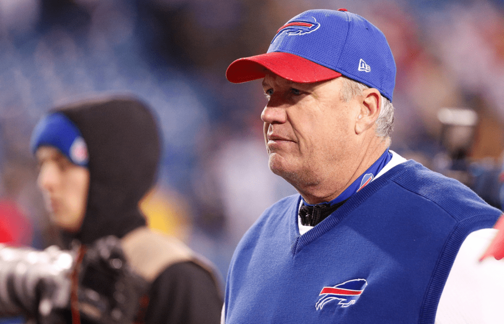 Buffalo Bills head coach Rex Ryan leaves the field after losing in overtime to the Miami Dolphins at New Era Field. The Dolphins beat the Bills 34-31 in overtime
