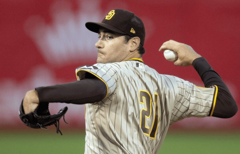 Sep 15, 2023; Oakland, California, USA; San Diego Padres starting pitcher Seth Lugo (21) delivers a pitch against the Oakland Athletics during the first inning at Oakland-Alameda County Coliseum. Players from both teams wore number 21 in honor of the late Roberto Clemente. Mandatory Credit: D. Ross Cameron-Imagn Images
