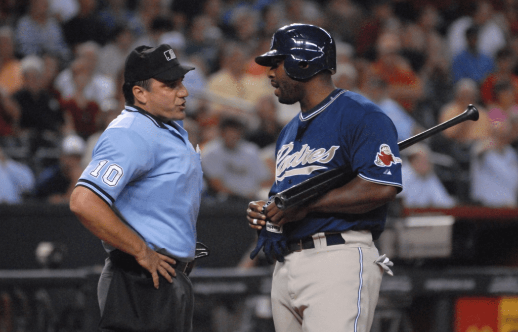 Sept 4, 2007; Phoenix, AZ, USA; San Diego Padres left fielder (15) Milton Bradley argues with home plate umpire Phil Cuzzi in the fifth inning against the Arizona Diamondbacks at Chase Field. Mandatory Credit: Mark J. Rebilas-Imagn Images
