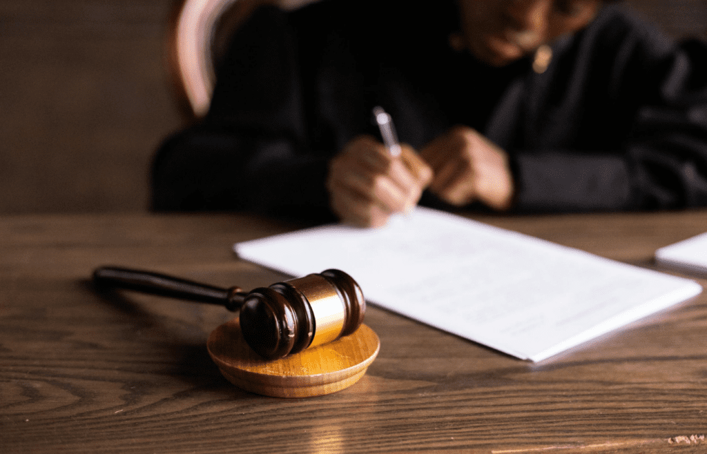 A courtroom with a judge's bench and gavel