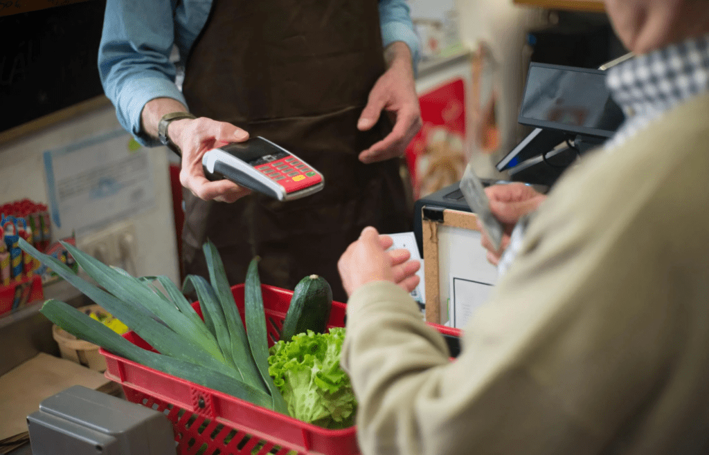 A person shopping with multiple credit cards