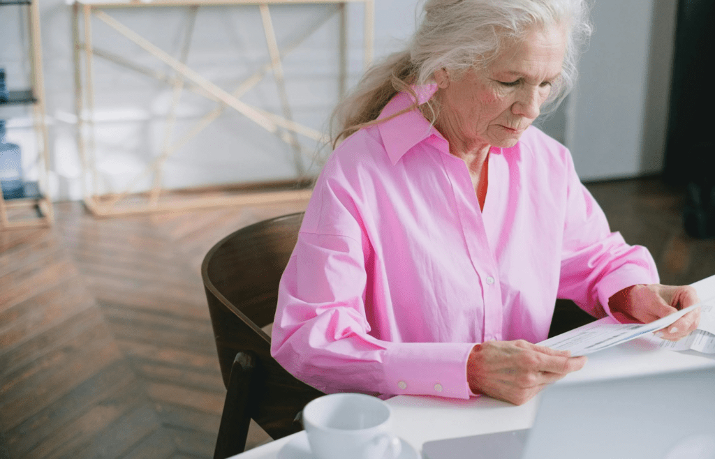 A person overlooking a retirement plan document