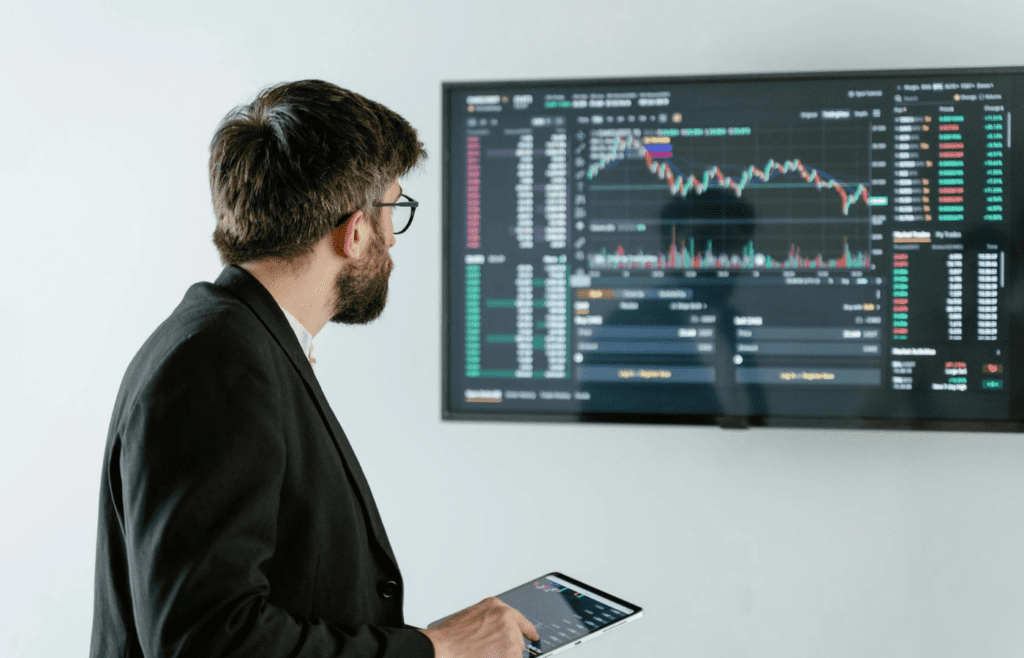 A person looking stressed while checking stock prices