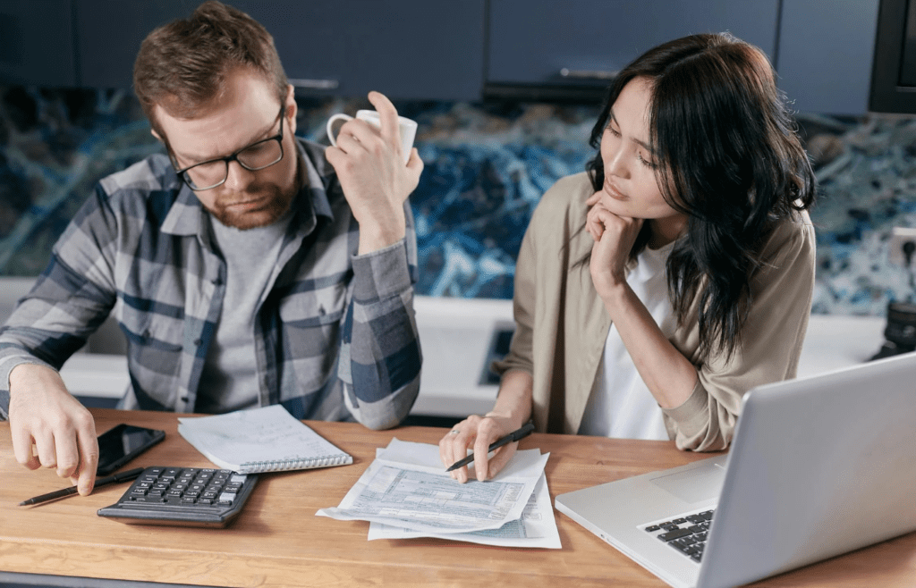 A person reviewing high utility bills