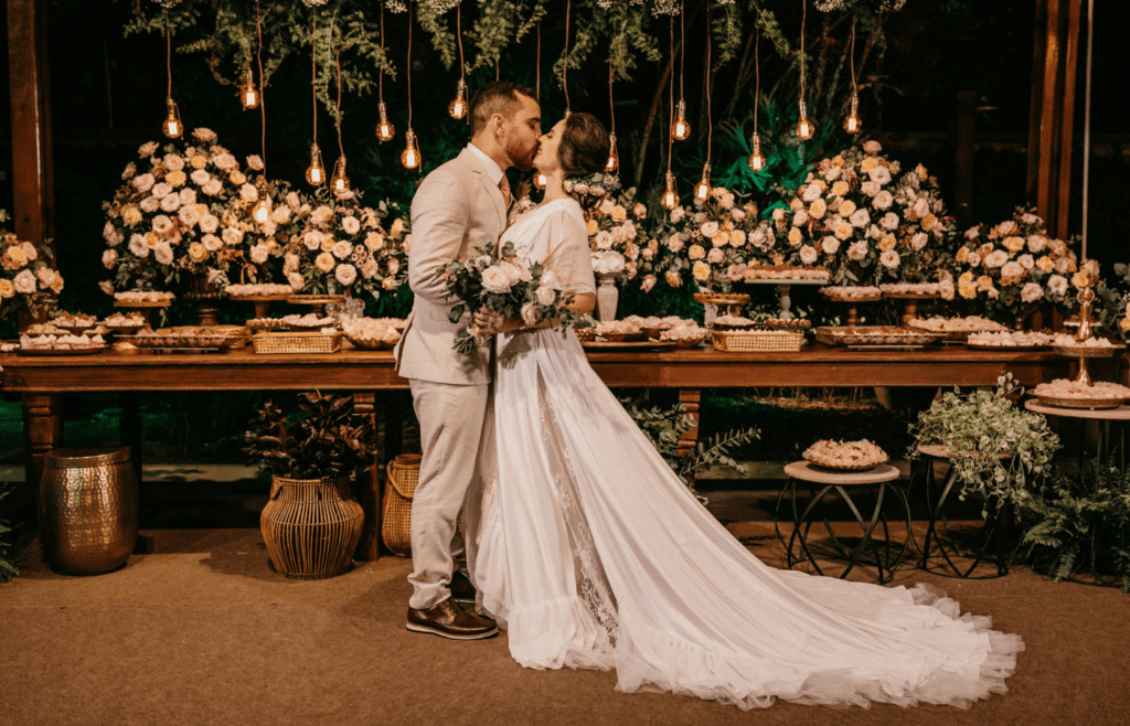 Extravagant wedding ceremony with large floral arrangements