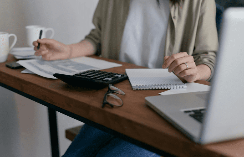 A person ignoring a budget spreadsheet