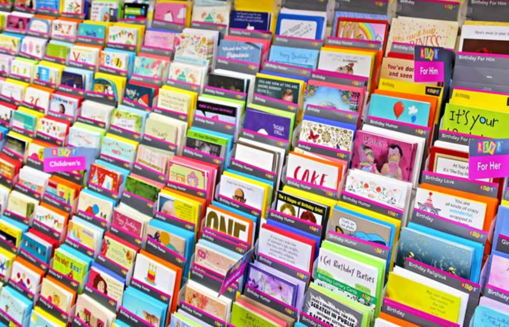 A rack full of colorful greeting cards