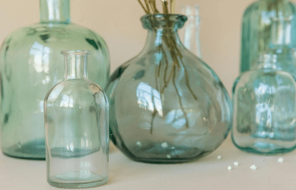 Decorative glass vases on a windowsill