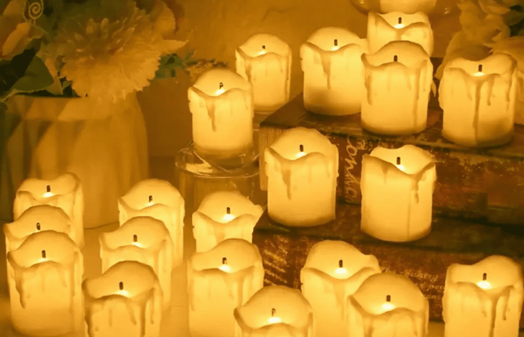 Small decorative candles on a shelf
