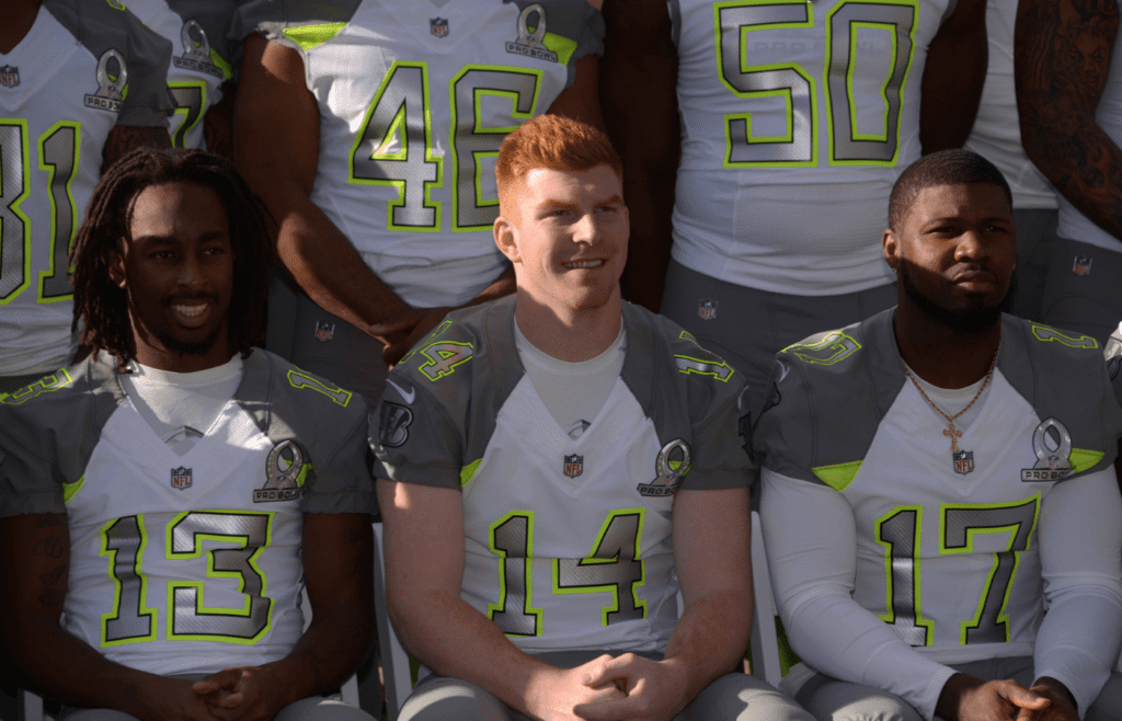 Jan 23, 2015; Phoenix, AZ, USA; Indianapolis Colts receiver T.Y. Hilton (13), Cincinnati Bengals quarterback Andy Dalton (14) and Atlanta Falcons return specialist Devin Hester (17) pose during team photos for the 2015 Pro Bowl at The Arizona Biltmore. Mandatory Credit: Kirby Lee-Imagn Images