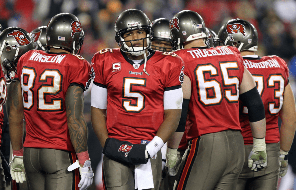 December 26, 2010; Tampa, FL, USA; Tampa Bay Buccaneers quarterback Josh Freeman (5) gets the team huddled up during the second half against the Seattle Seahawks at Raymond James Stadium. Tampa Bay Buccaneers defeated Seattle Seahawks 38-15. Mandatory Credit: Kim Klement-Imagn Images
