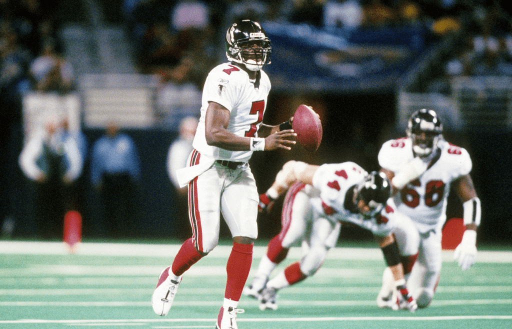 Jan 6, 2002; St. Louis, MO, USA; FILE PHOTO; Atlanta Falcons quarterback Michael Vick (7) in action against the St. Louis Rams at the Edward Jones Dome. Mandatory Credit: James D. Smith-Imagn Images
