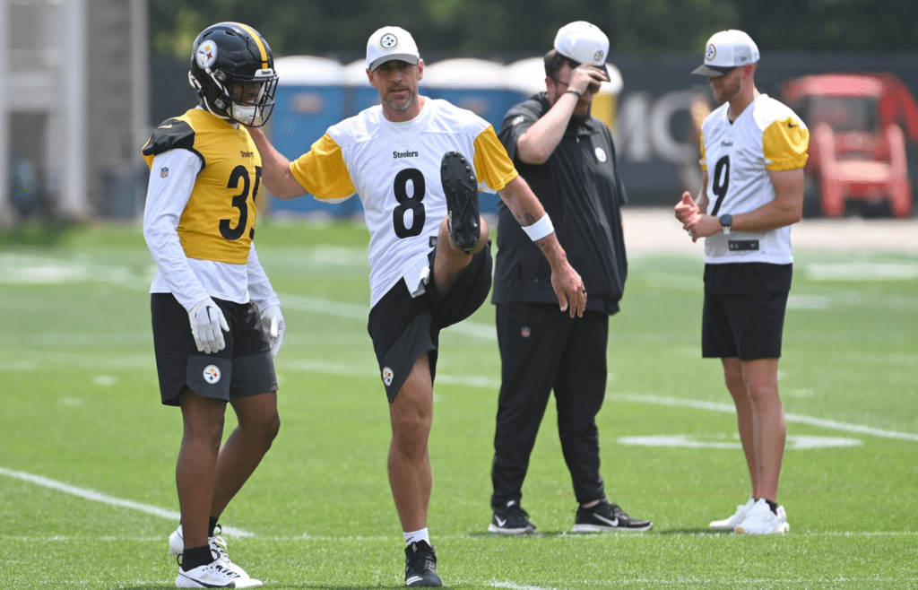 Jun 10, 2025; Pittsburgh, PA, USA; Pittsburgh Steelers quarterback Aaron Rodgers (8) stretches during minicamp at their South Side facility. Mandatory Credit: Philip G. Pavely-Imagn Images