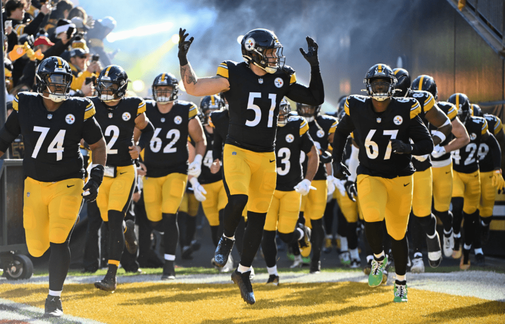 Dec 8, 2024; Pittsburgh, Pennsylvania, USA; Pittsburgh Steelers linebacker Nick Herbig (51) leads the team onto field for a game against the Cleveland Browns at Acrisure Stadium. Mandatory Credit: Barry Reeger-Imagn Images
