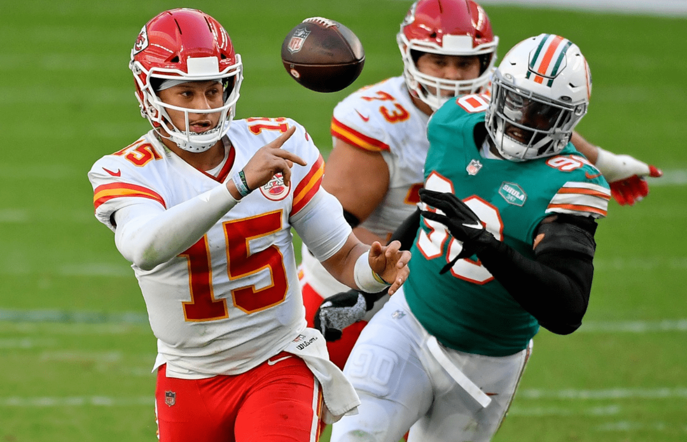 Dec 13, 2020; Miami Gardens, Florida, USA; Kansas City Chiefs quarterback Patrick Mahomes (15) attempts a pass against the Miami Dolphins during the first half at Hard Rock Stadium. Mandatory Credit: Jasen Vinlove-Imagn Images